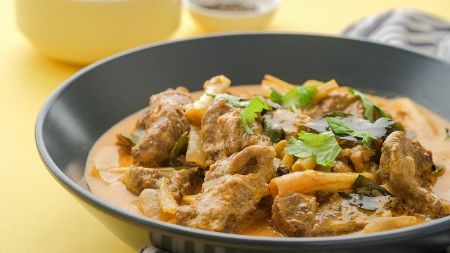 beef kulma or beef stew in coconut milk in a gray bowl