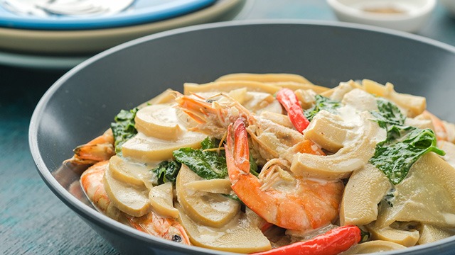 ginataang labong or bamboo shoots in coconut milk in a gray bowl