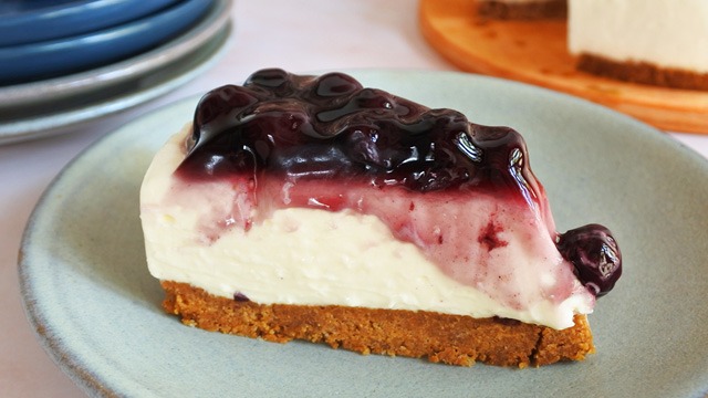 blueberry cheesecake slice on a plate