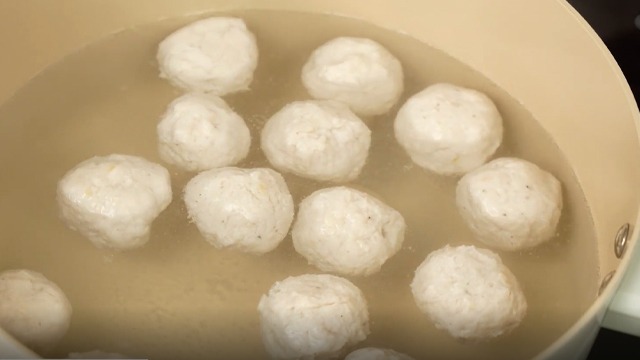 floating chicken balls in boiling water