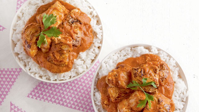 two bowls of chicken tikka masala